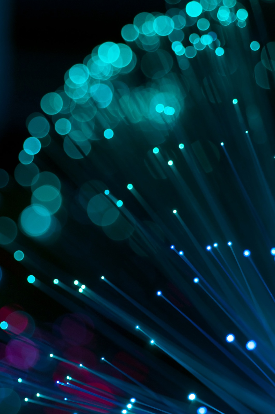 Teal and cyan fiber optic cable bundle with bokeh light for Epo-Weld™ UHB ultra high bond epoxy fiber optic