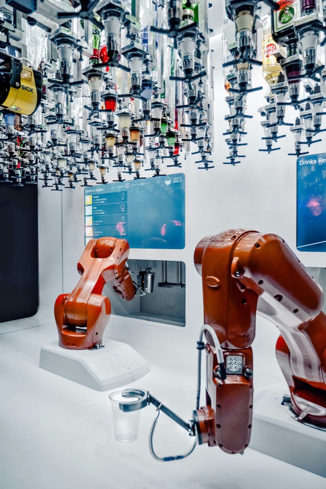 Robotic assembly system for Incure S20™ UV spot lamp multi-point fixture bonding